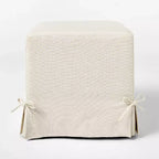 Pouf cubo con rivestimento sfoderabile e dettagli con legacci color crema